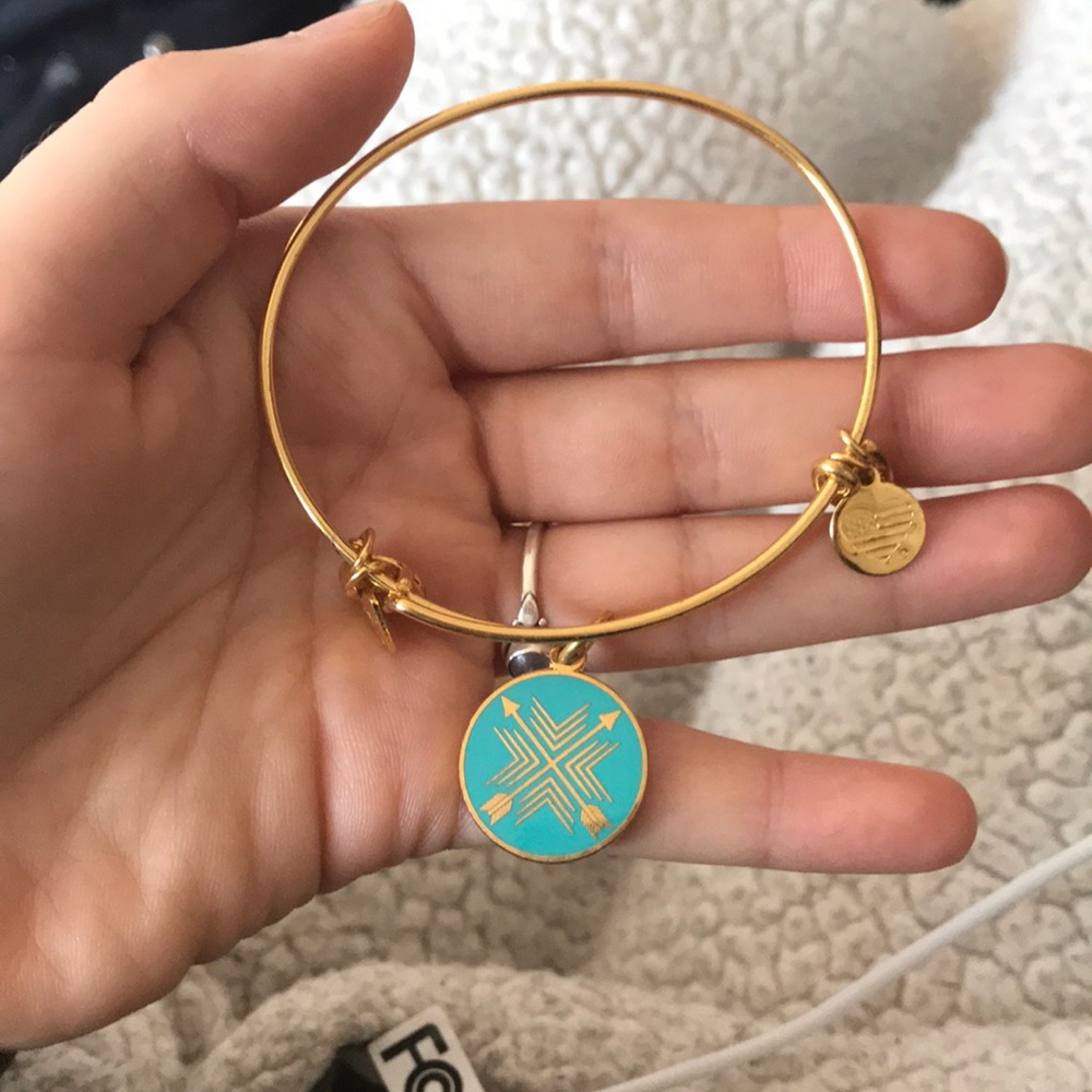 Three Alex and Ani bracelets